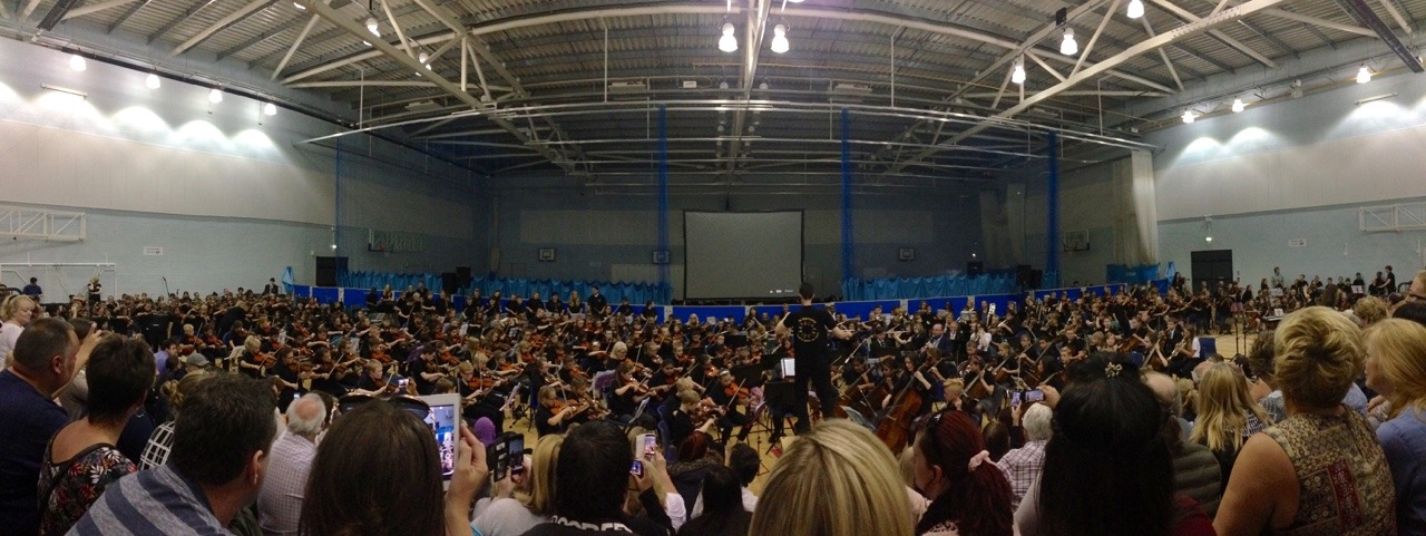 Full orchestra playing in school - Camerata